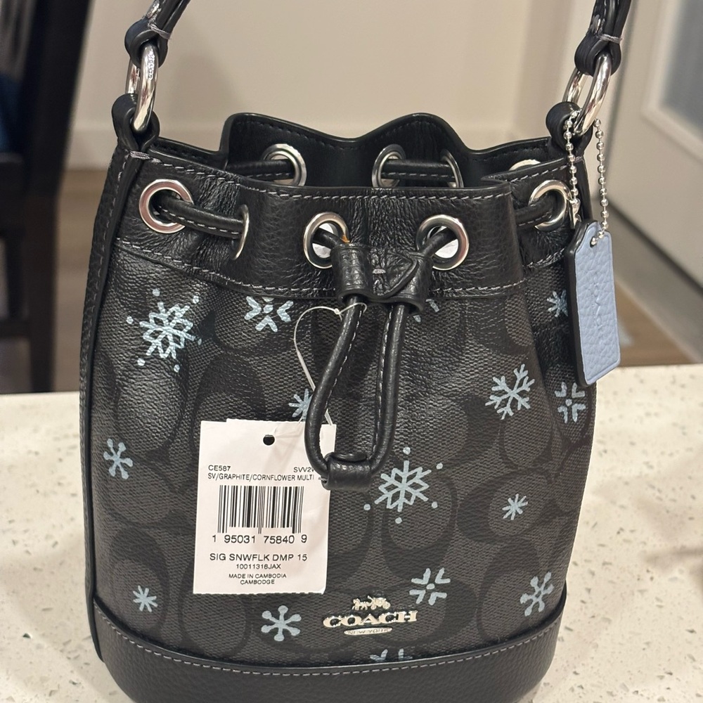Coach Dempsey Drawstring Bucket Bag Black Signature Canvas With Snowflake Print